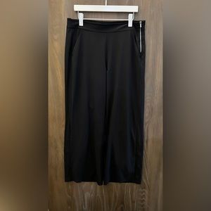 ATHLETA long black pant. Side zipper with button detail at the bottom of…
